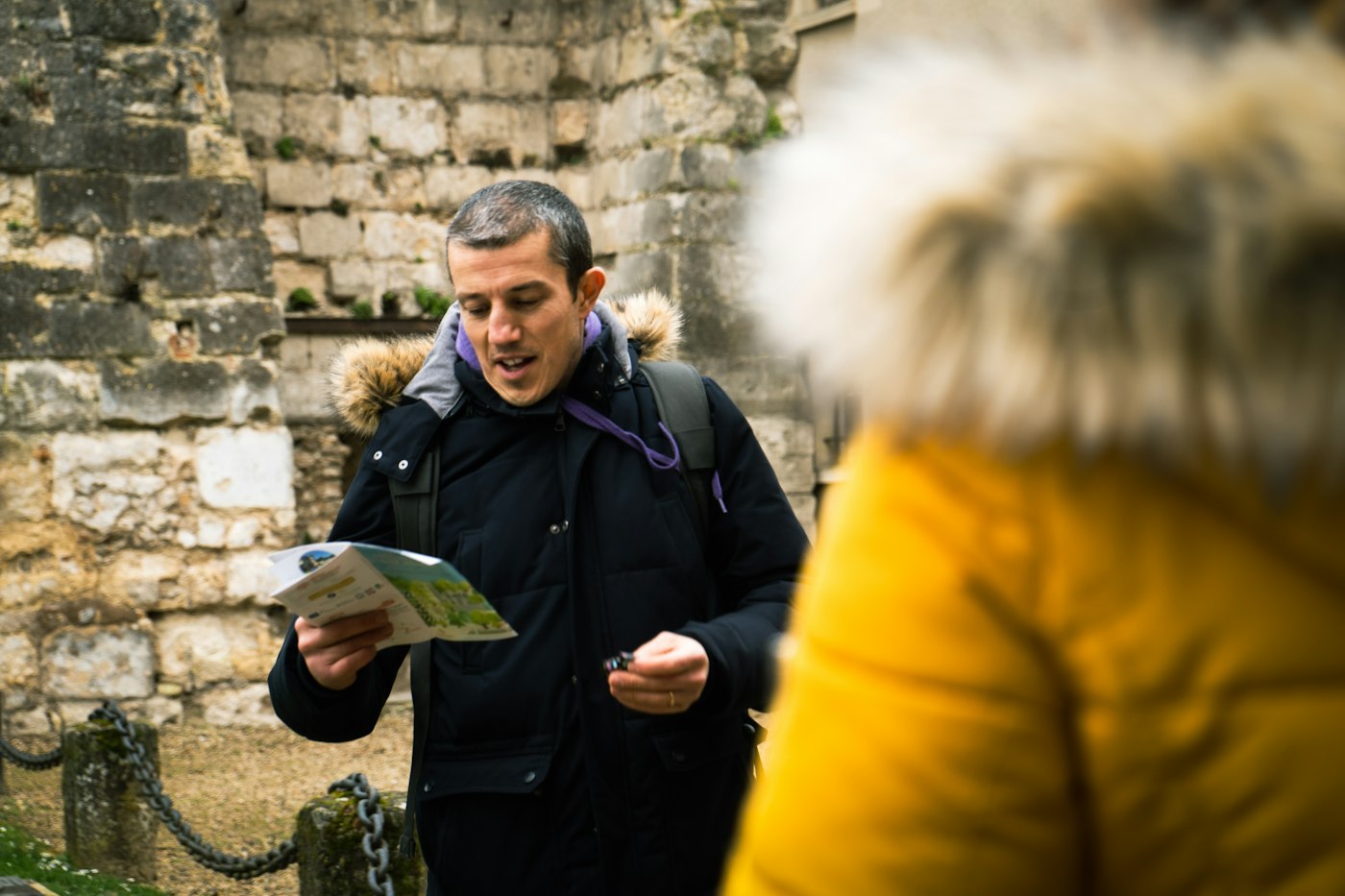 A host talking with a visitor